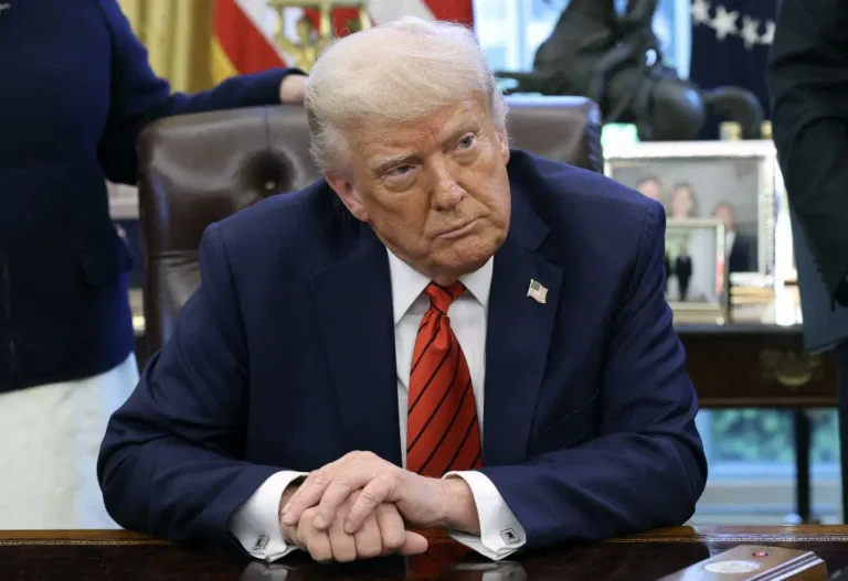 AFP__20250418__2210784282__v3__Preview__PresidentTrumpSignsExecutiveOrdersInTheOvalO
