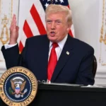 AFP__20251128__86EZ9HM__v2__MidRes__DonaldTrumpParticipatesInACallWithServiceMembers-960x640